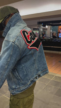 Load and play video in Gallery viewer, Black & Red “Cascade” SW Atlanta Blue Denim Jacket